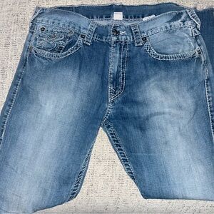 Mens True Religion size 36 skinny frayed bottom jeans